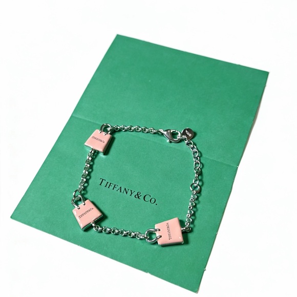 Tiffany & Co. Jewelry - Tiffany & Co. Silver Bracelet with Pink Charms